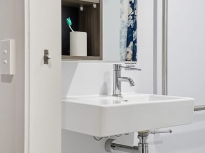White sink with faucet and towel holder at Mayoral Drive Student Accommodation.