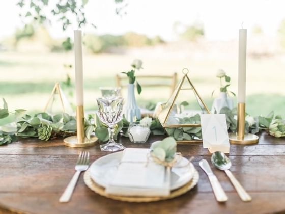 Arranged dining table with cutlery at The Magnolia Hotel