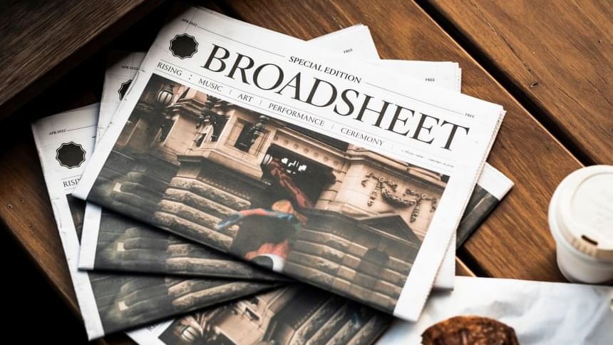 broadsheet newspaper stack