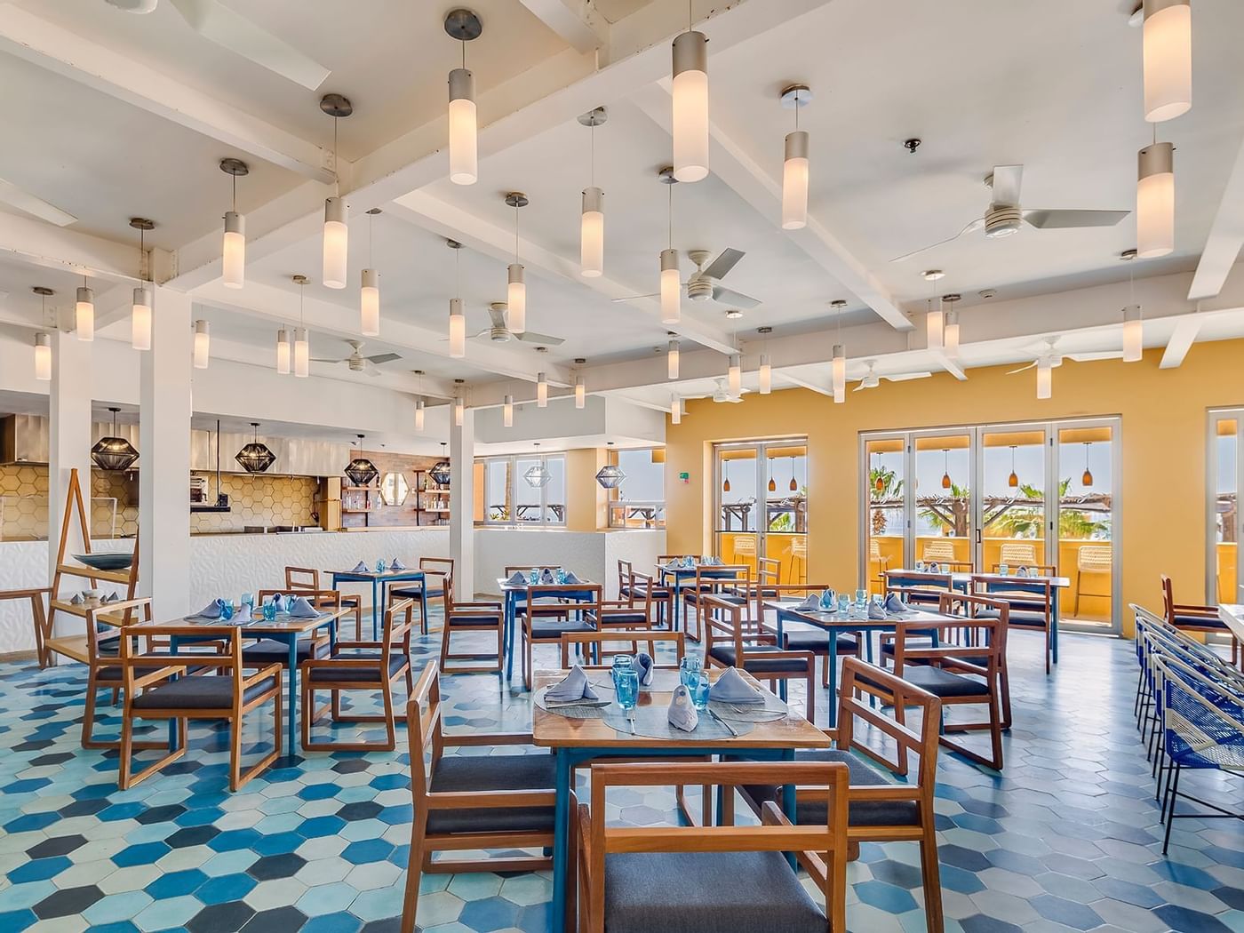 Dining table setup in Blu Restaurant at Grand Fiesta Americana