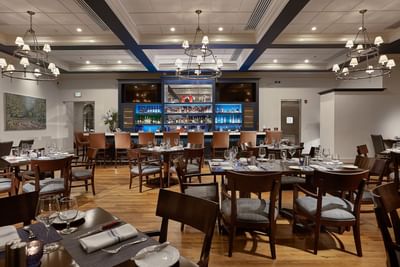 Dining area in Olde Florida Chop House at Trianon Bonita Bay