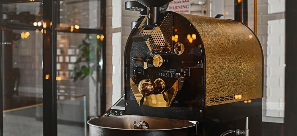 Close-up of a coffee roasting machine in Craft Table Artisan Café & Bakery at Paramount Hotel Dubai