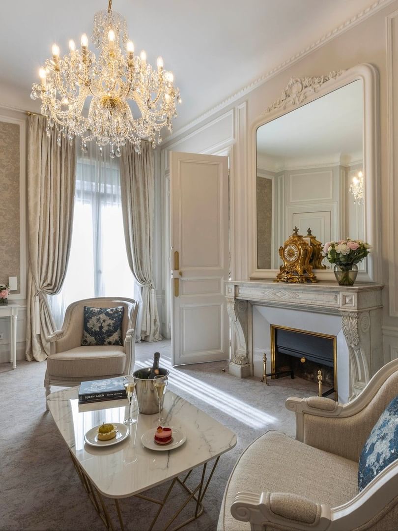 Elegant living room of the Prestige Suite with Rue de la Paix View at Hôtel Westminster Paris.