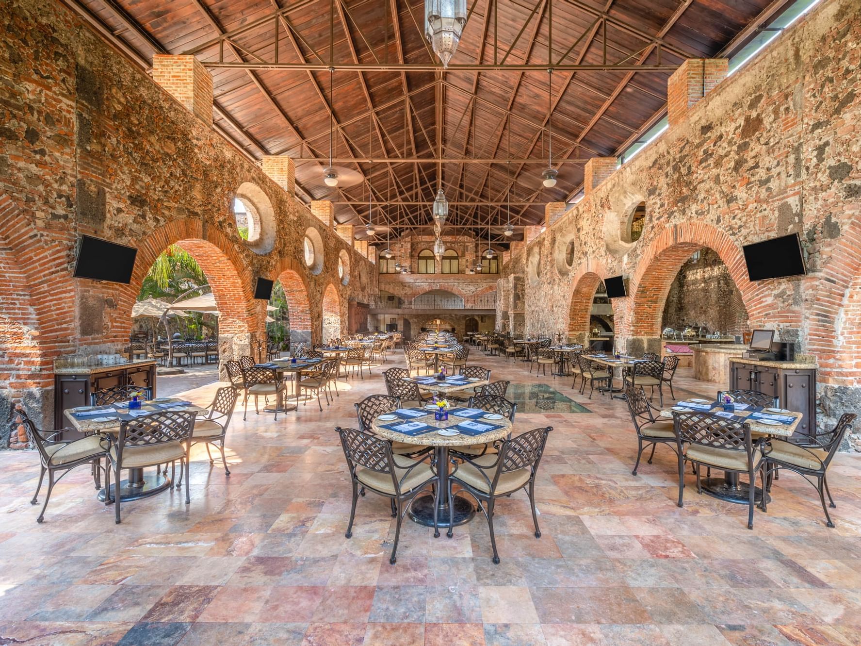 Large dining area in Bar Los Gavilanes at La Colección Resorts