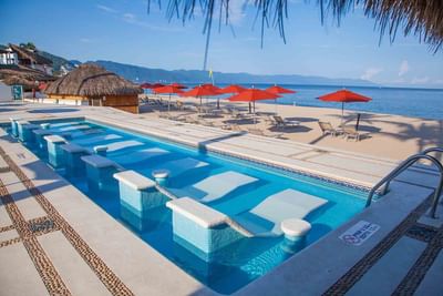 Wet loungers with ocean view at Buenaventura Grand Hotel