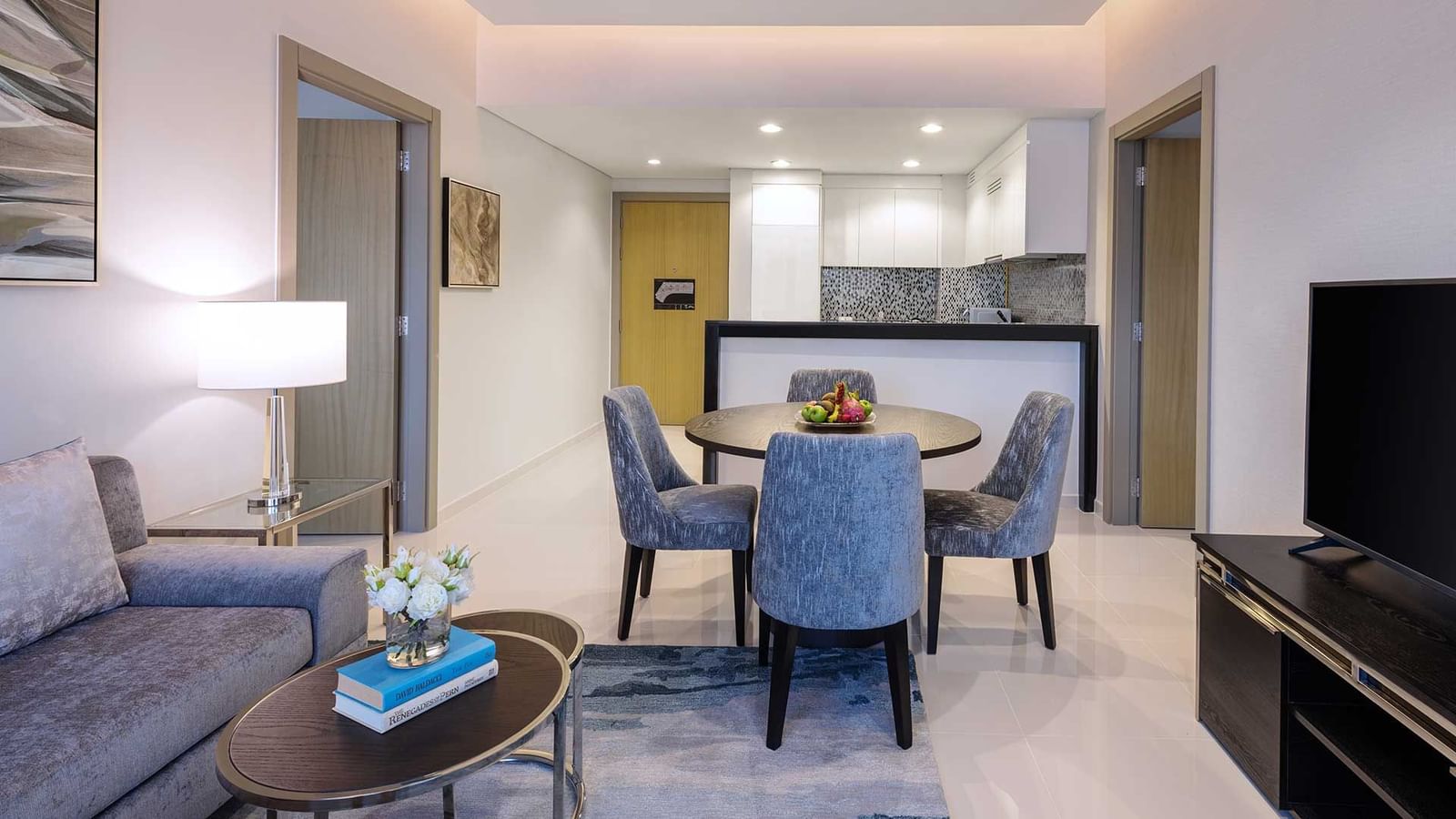 Living area with a dining table in One Bedroom at DAMAC Maison Aykon City