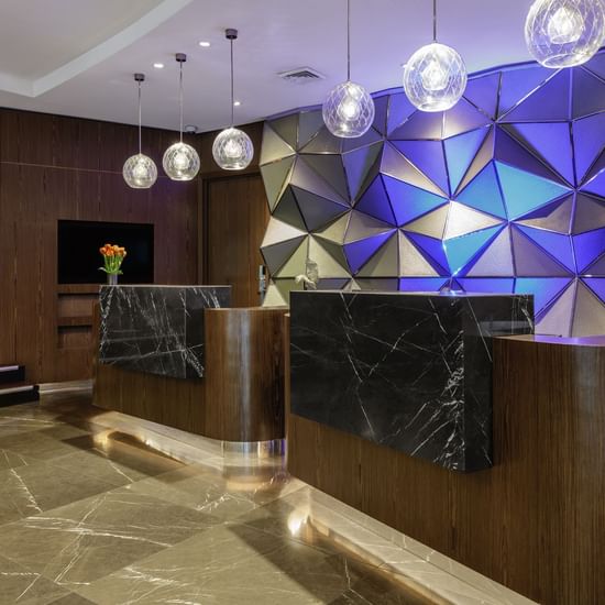 Front desk by the lobby area at Pullman Sydney Hyde Park