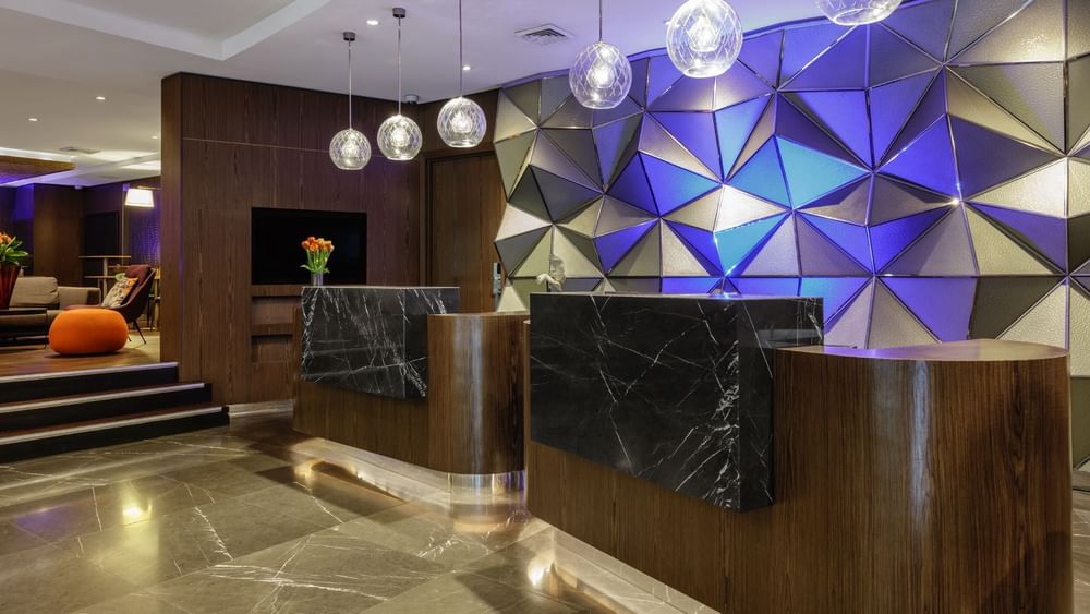 Front desk by the lobby area at Pullman Sydney Hyde Park
