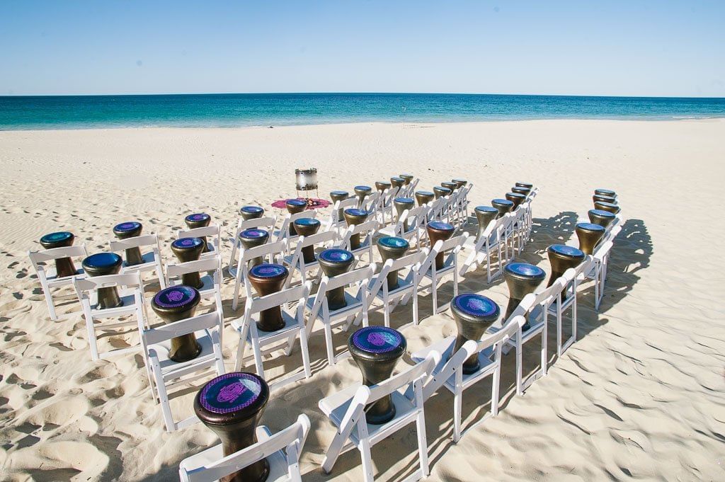 Chairs setup for an event in beach at Pullman Bunker Bay Resort