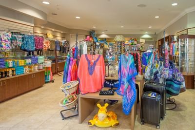 Clothing and travel items in shop