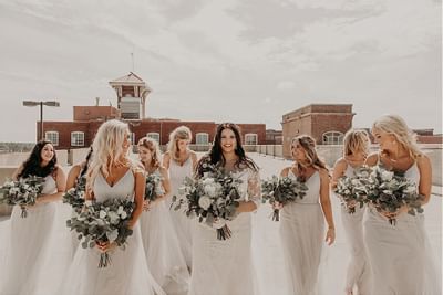 Bride with bridesmaids on Hotel at Old Town Parking Garage