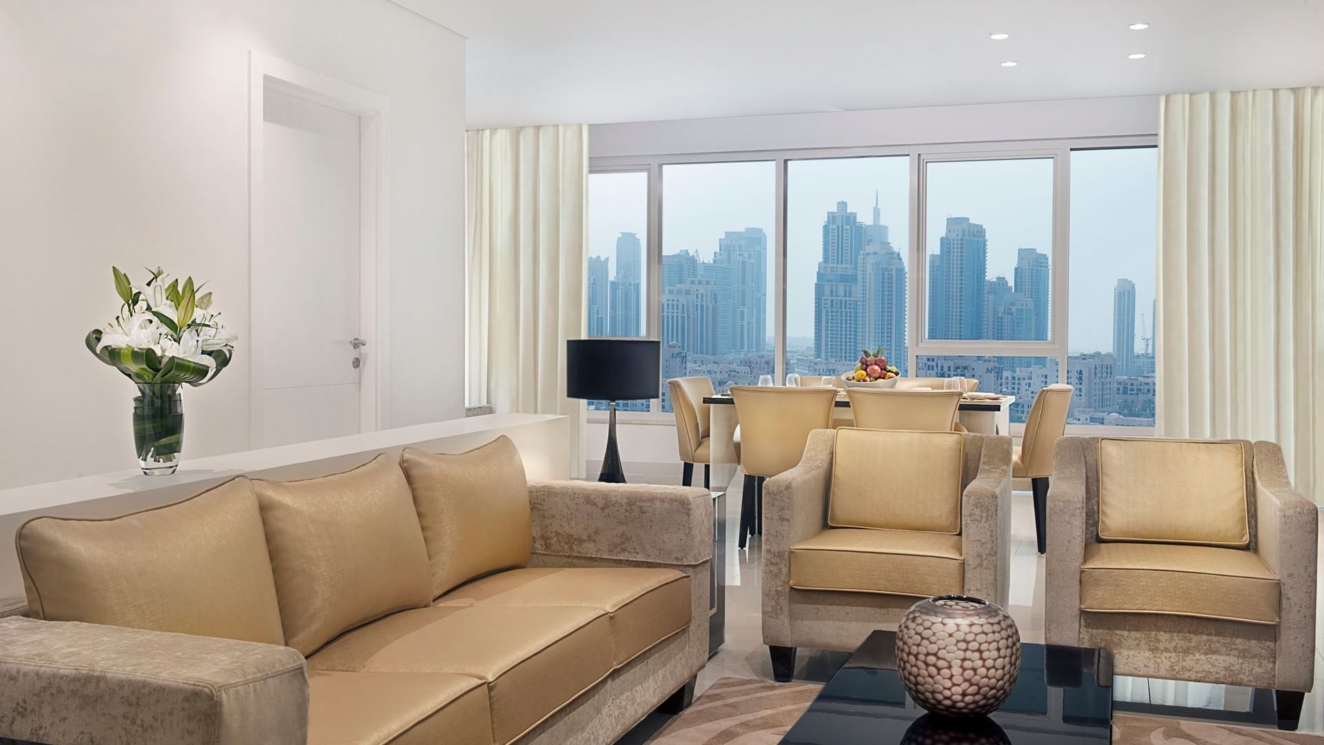 Elegant interior of living space in  Two Bedroom Suite at DAMAC Maison Canal Views