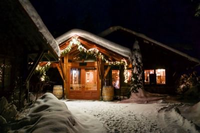 Entrance view of gift shop covered with snow at Sleeping Lady