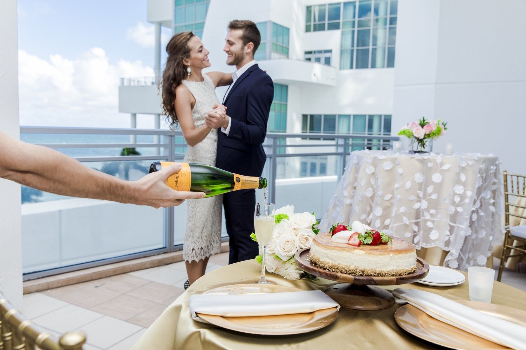 Bride & Groom being served on the balcony, The Diplomat Resort