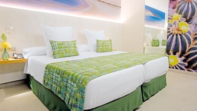 Camas en Habitación de Lujo en Hotel Lemon & Soul Cactus Garden