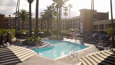 A pool at Hotel Grand Legacy at The Park Anaheim.