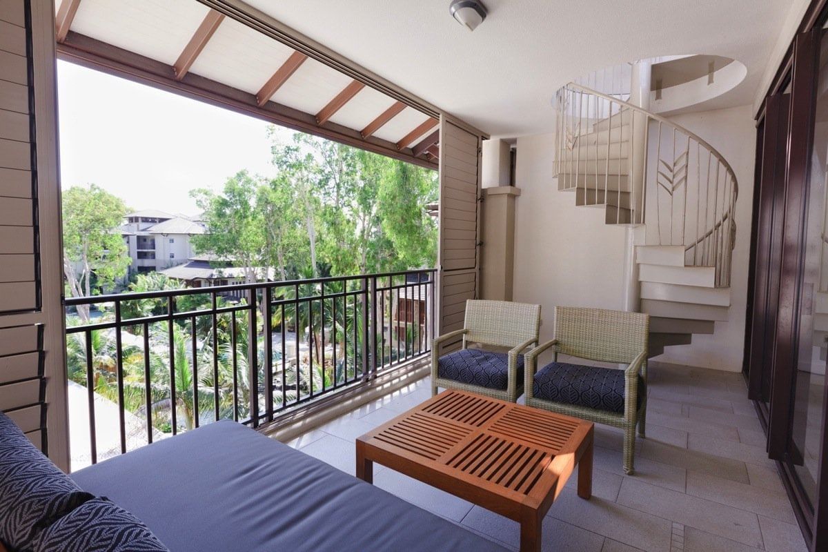 Balcony with a out door stair at Pullman Palm Cove Sea Temple