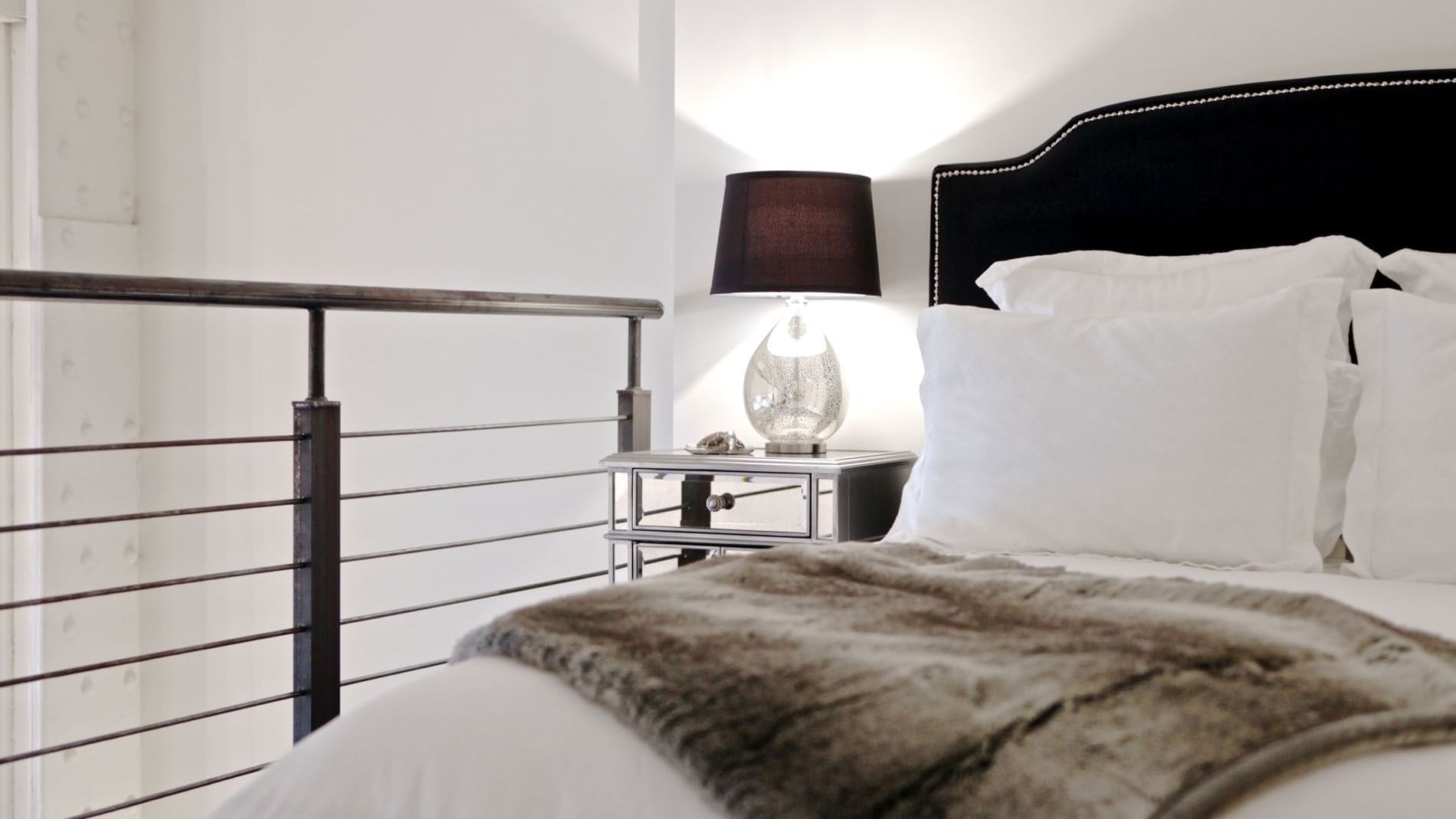 Close-up of bed with pillows, Loft Style Unit B, The Mayo Hotel