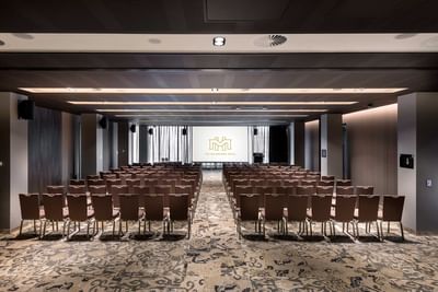 Conference set-up with a screen in Karingal Ballroom at Melbourne Hotel Perth
