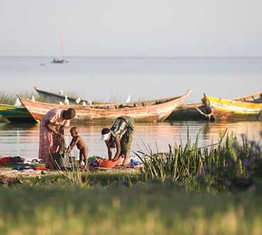 Villagers fishing in Lake Victoria at Kirawira Serena Camp