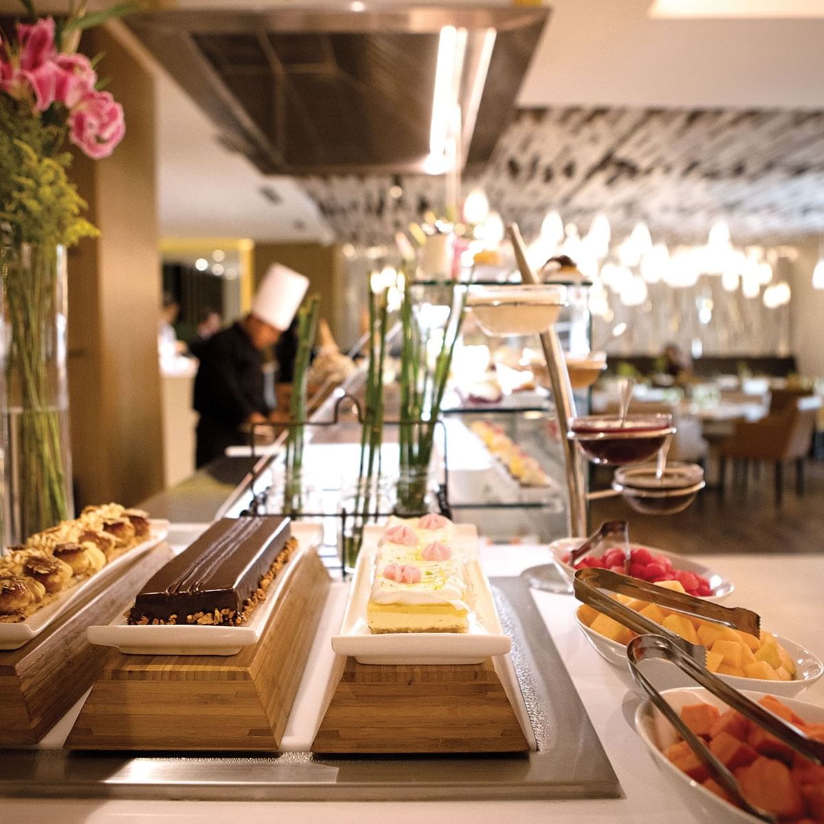 Chef's table with desserts at an event at Tikal Futura Hotel