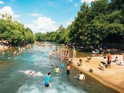 People enjoying Barton Springs Municipal Pool near Austin Condo