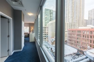 Cityscape from Deluxe King Corner Room hallway at Kinzie Hotel