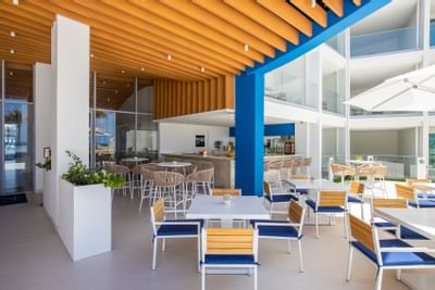 Outdoor dining table arranged at The Morgan Resort Spa Village