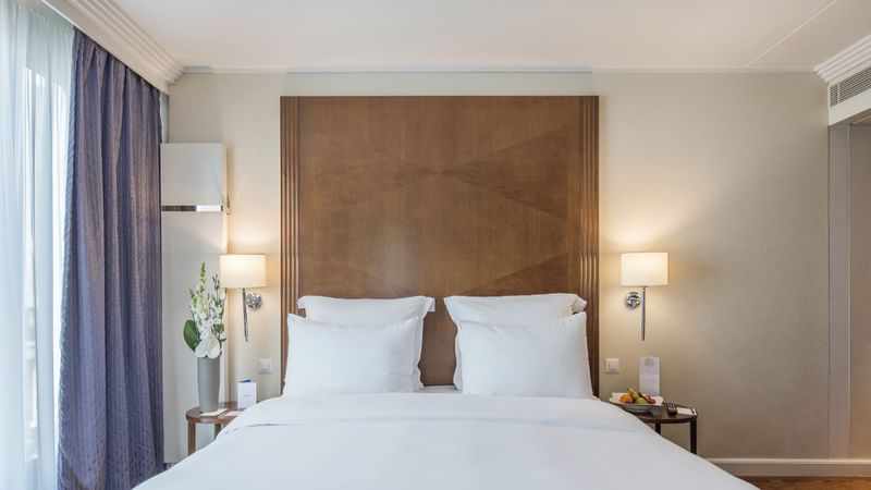 Close-up of a king-size bed in Classic Room at Warwick Geneva