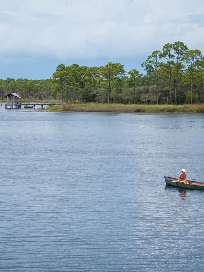 A couple rowing on the river at The lodge 30A