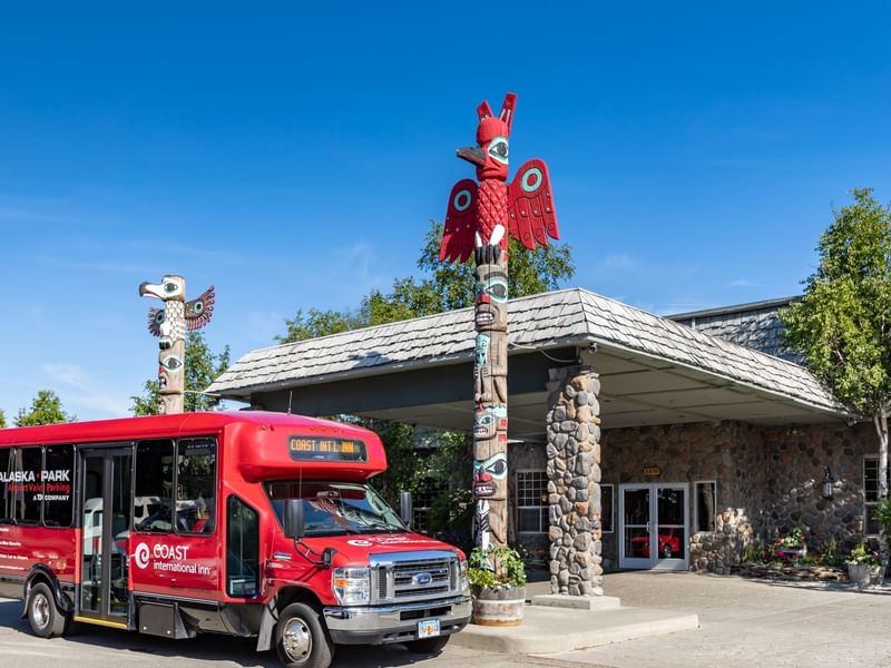 Red bus shuttle at hotel