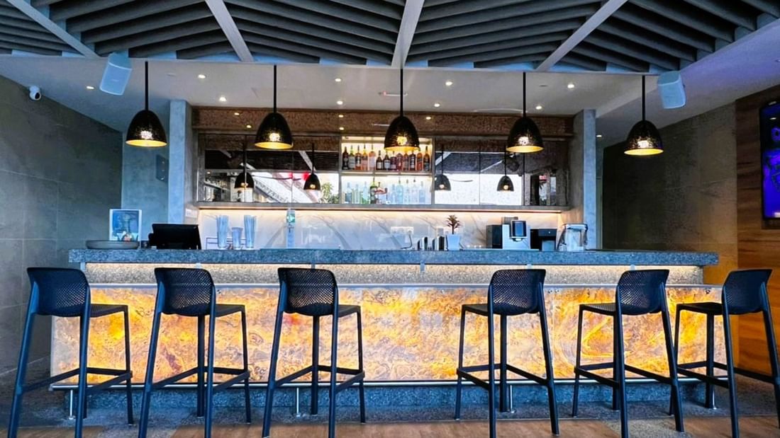 Modern bar interior with high-stools and bar counter at Sunway Hotel Big Box