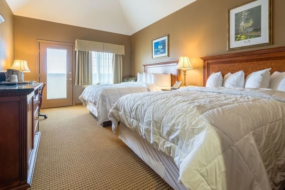 Standard Double Queen interior with two beds at The Wildwood Hotel