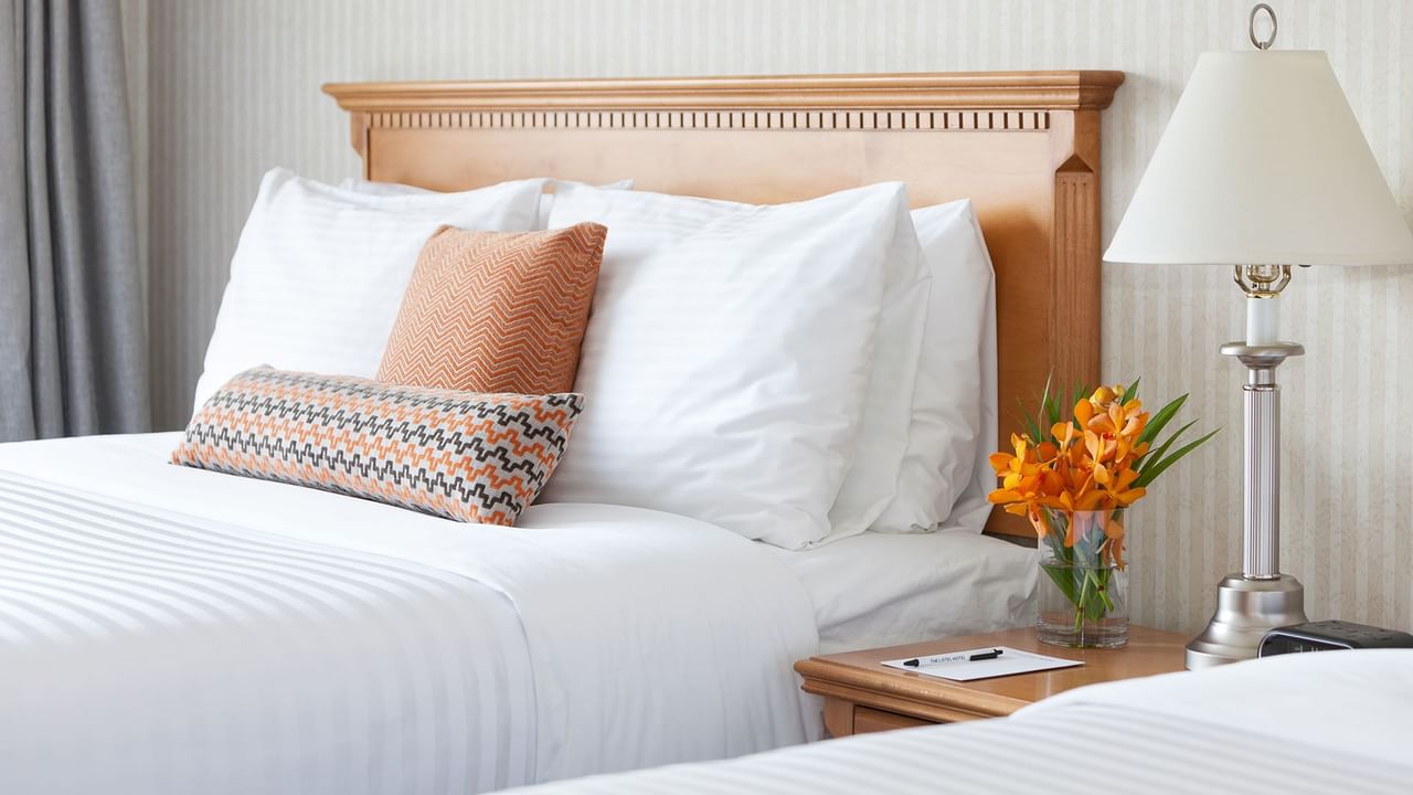 Queen bed in a spacious room