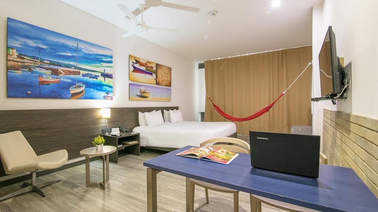Bedroom arrangement in WOW superior suite at DOT Hotels   