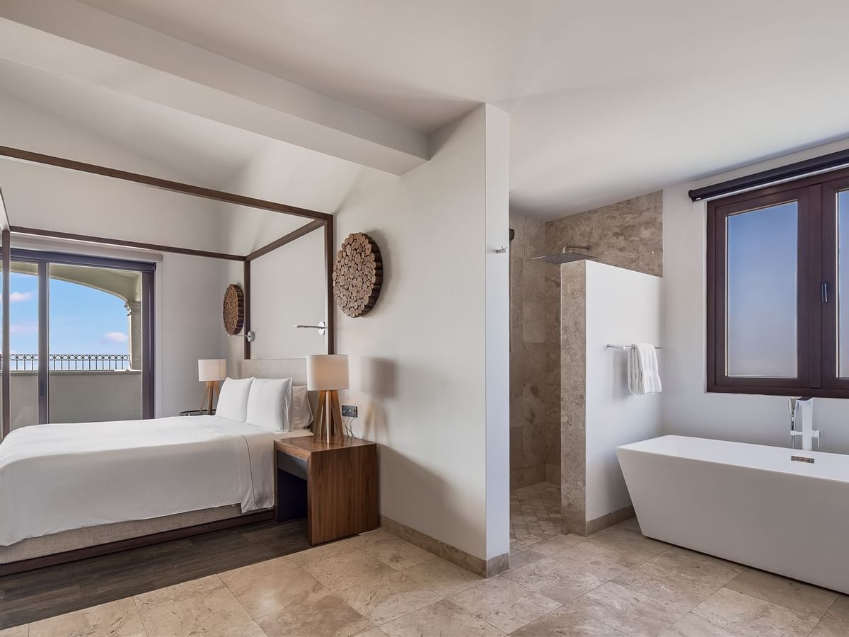 King bed & bathtub in Two Bedroom Residence at Live Aqua Resorts