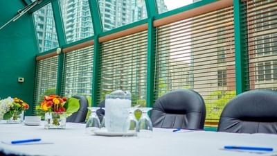 Glass-walled Yaletown Rooms set for a conference at Rosedale on Robson, one of the top meeting rooms in Vancouver, BC
