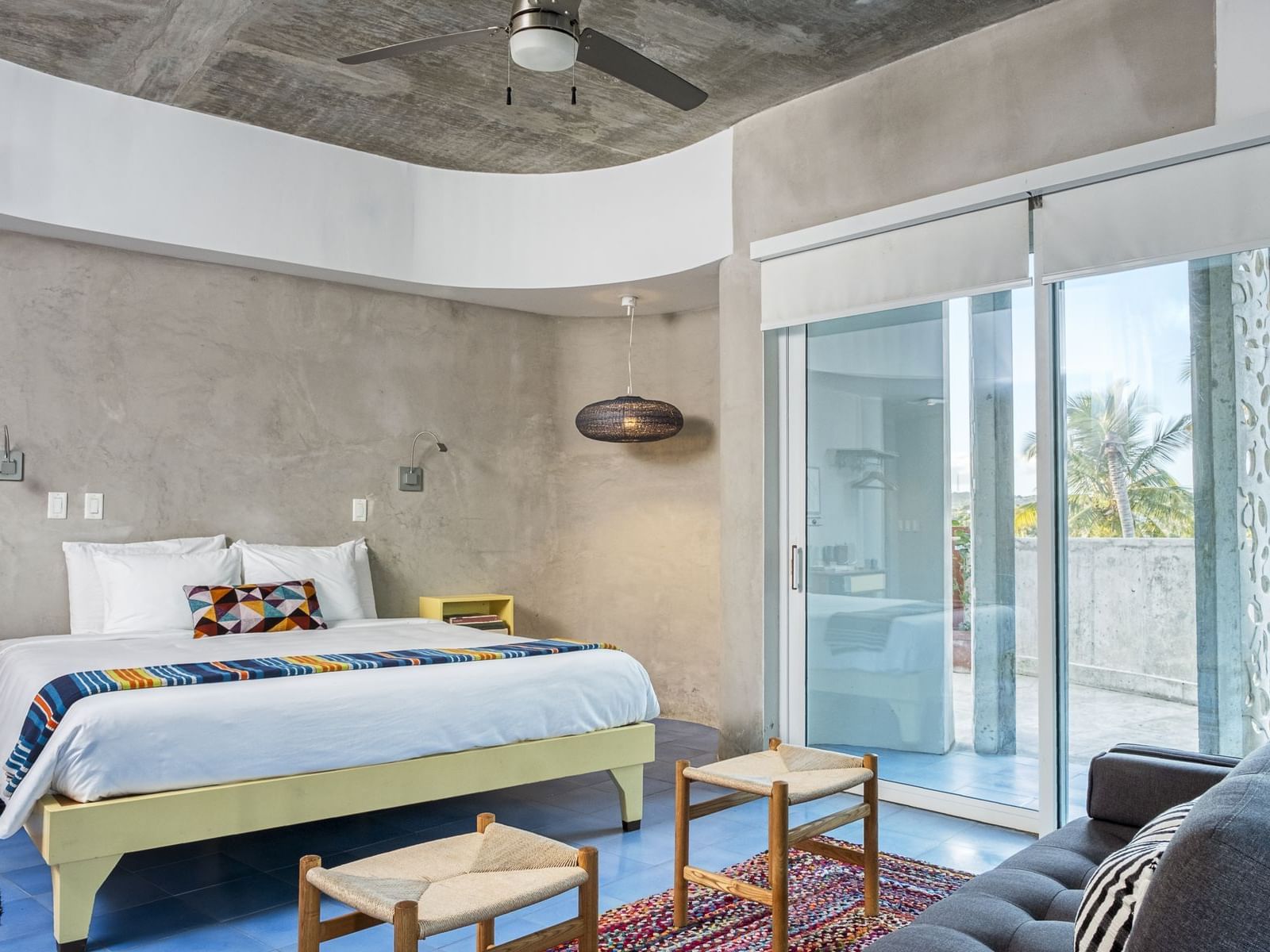 The Solana bedroom with a King Bed at El Blok Hotel