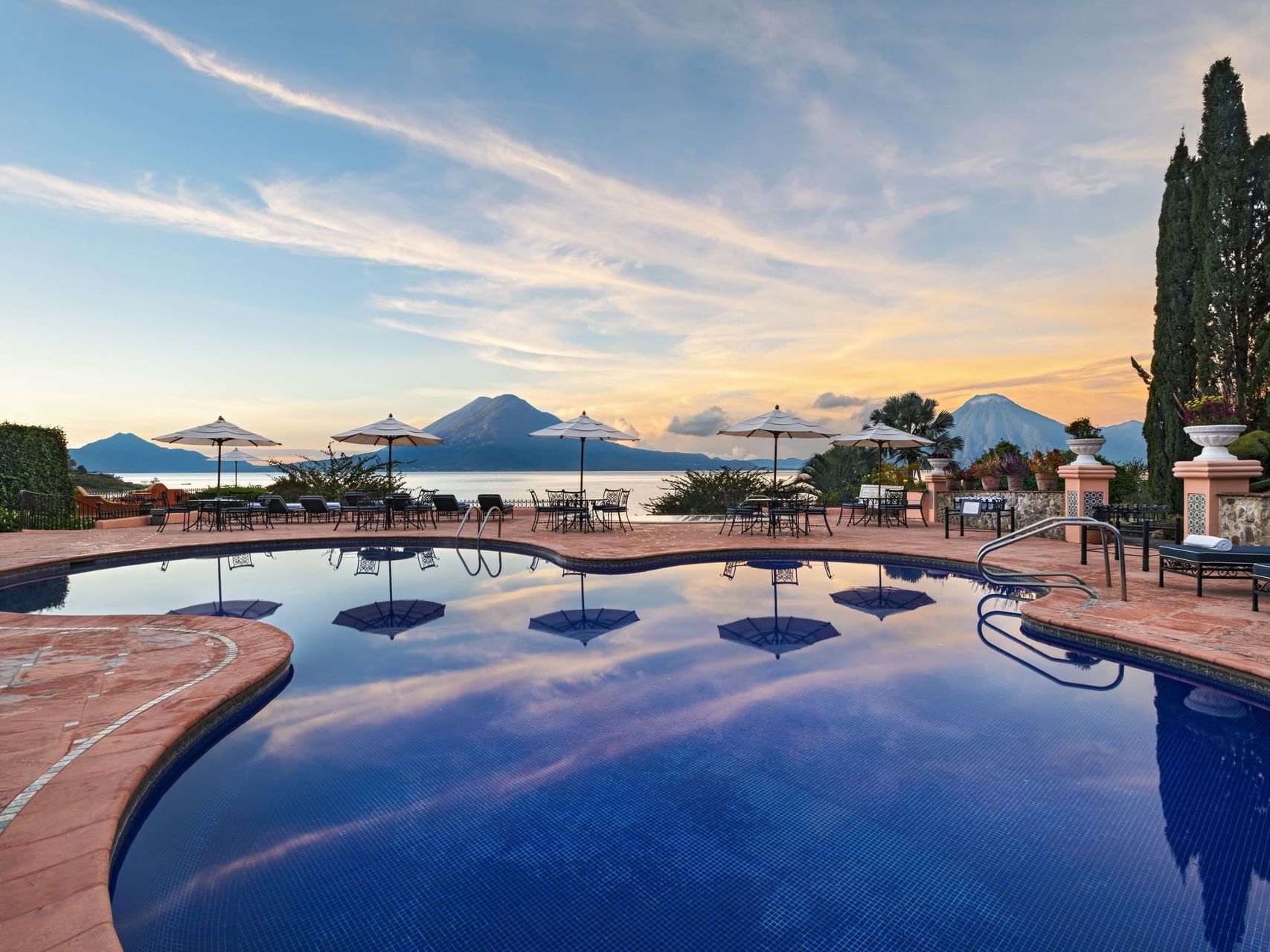 Dining & lounge area by the outdoor pool at Hotel Atitlan