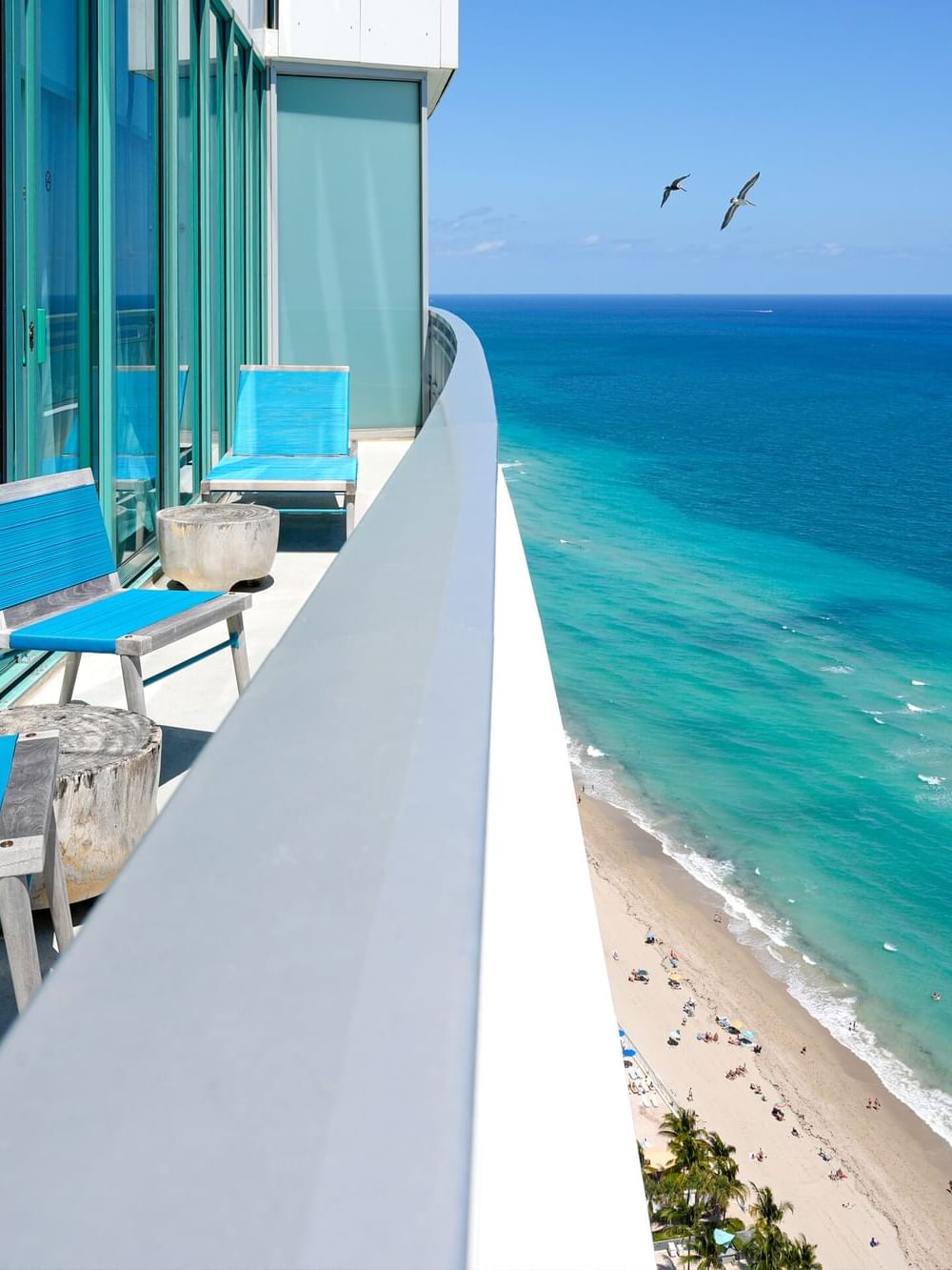 Balcony lounge area of 2 Bedroom Family Suite - Oceanfront View Balconies at Diplomat Beach Resort