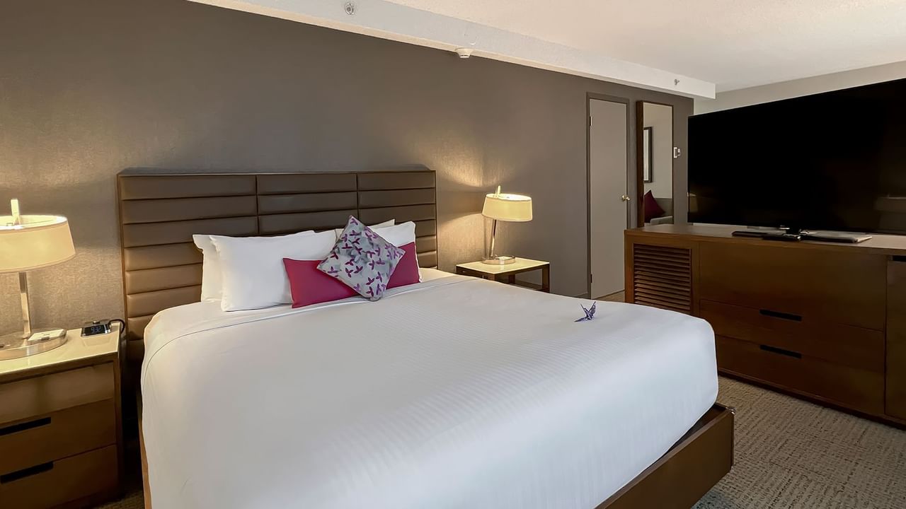 Bed and tv in a hotel room