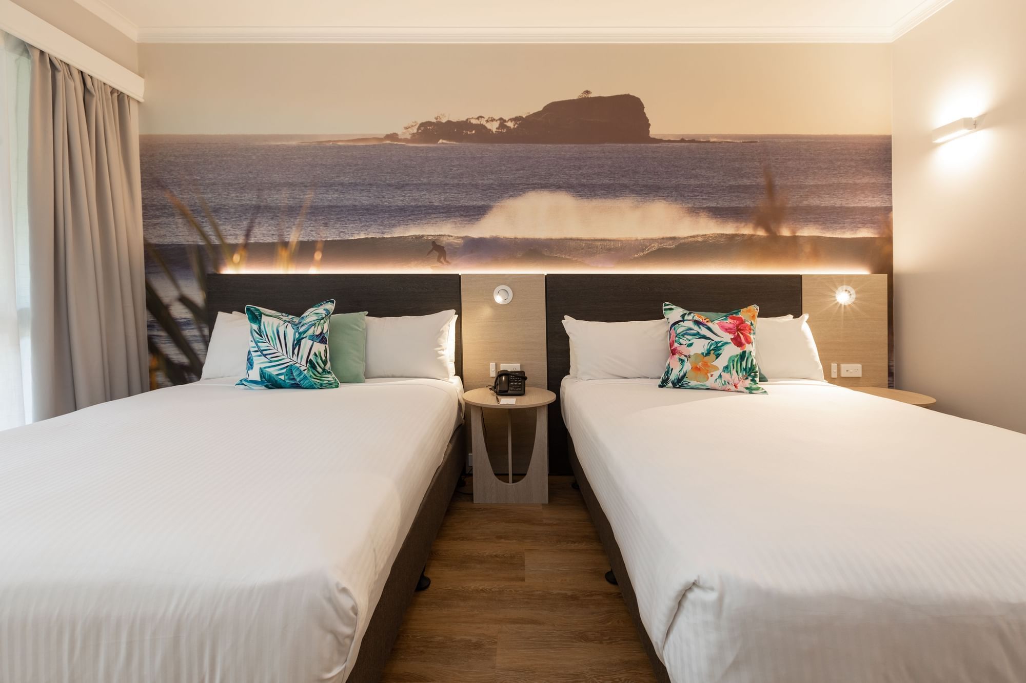 Two bed with nightstand by the window in Executive Resort Rooms at Novotel Sunshine Coast Resort