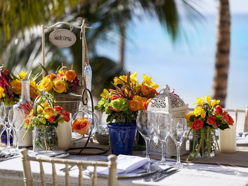 Close-up of wedding table set-up with fresh flowers outdoors at Grand Fiesta Americana Hotel and Resorts