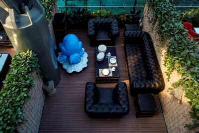 Lounge area of Deluxe King with Terrace at Hotel Eclat Beijing