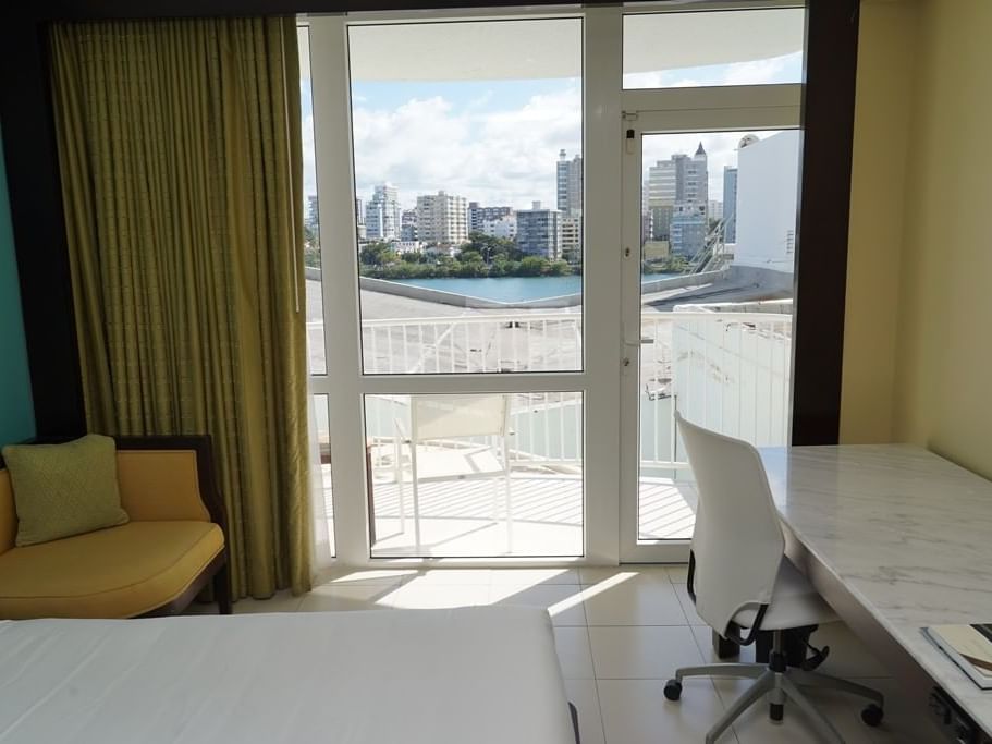 Standard Room with writing table and a chair at Condado Plaza 