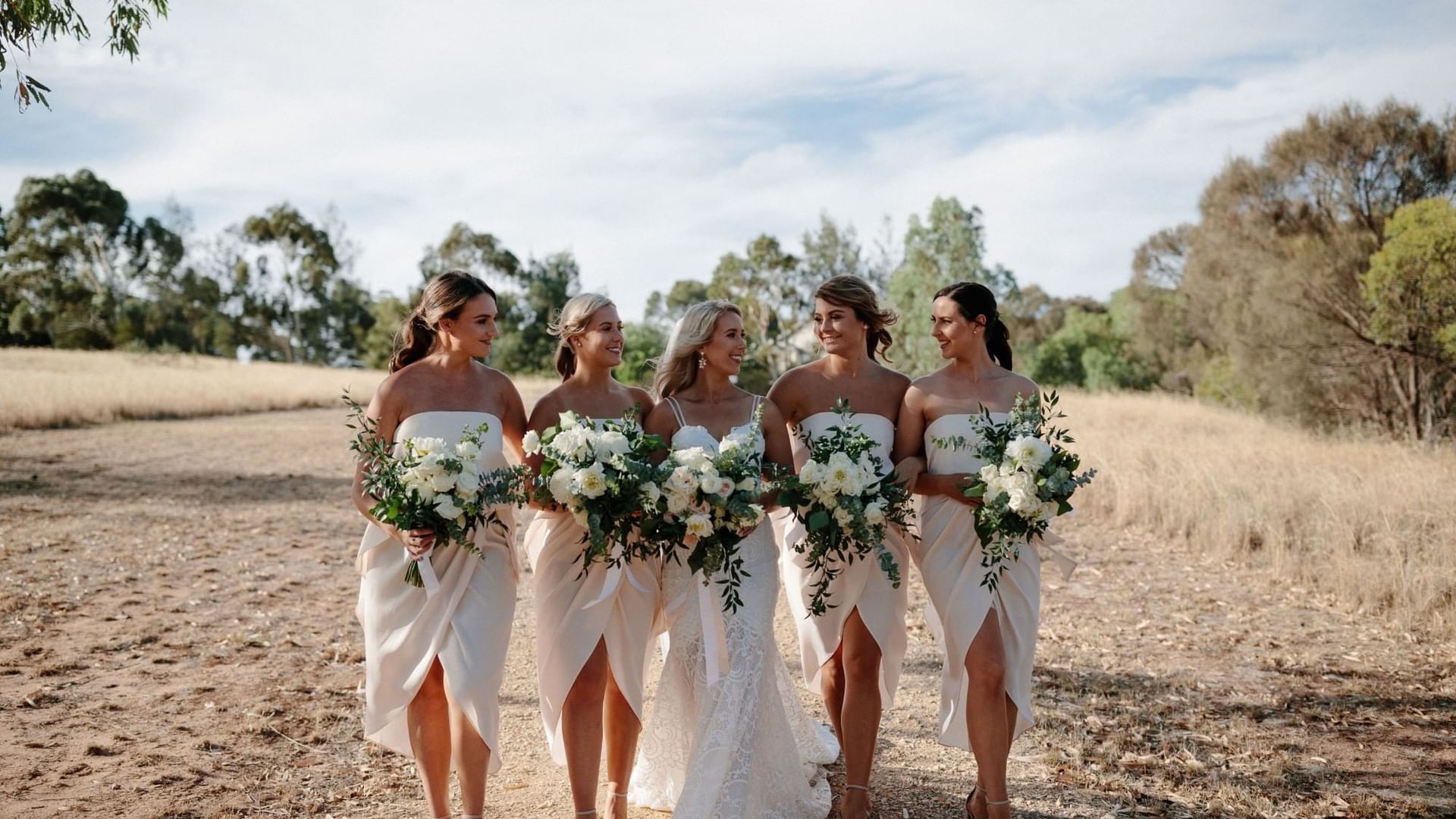 Bride with bridesmaids in elegant dresses at Novotel Barossa