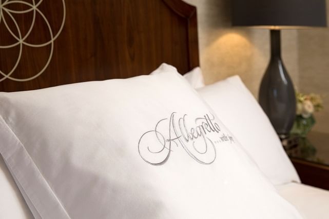 Headboard details and pillows with in the rooms at at Allegretto