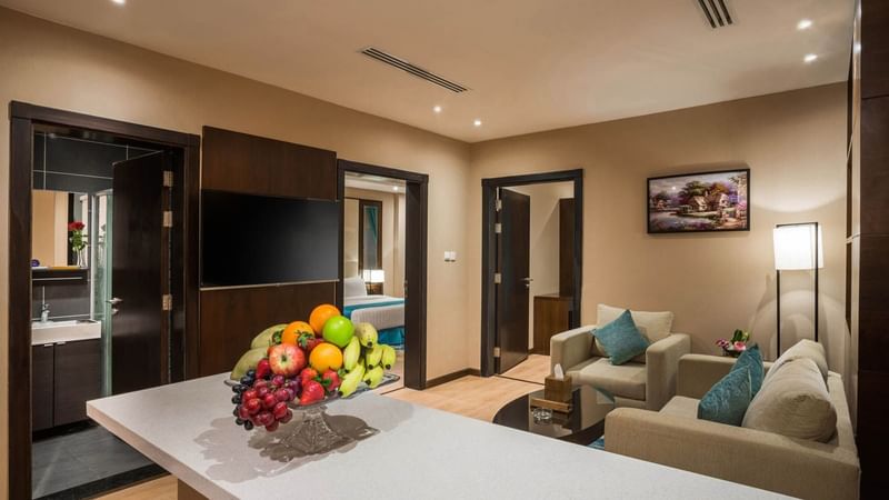 Interior view of living area with a sofa at Naviti By Warwick Dammam