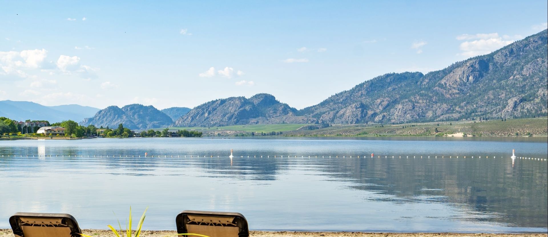 Beach chairs with view of lake and mountains