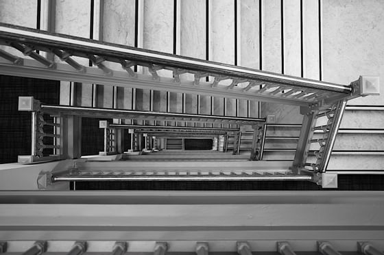 Overhead view of winding staircases at The Godfrey Boston Hotel